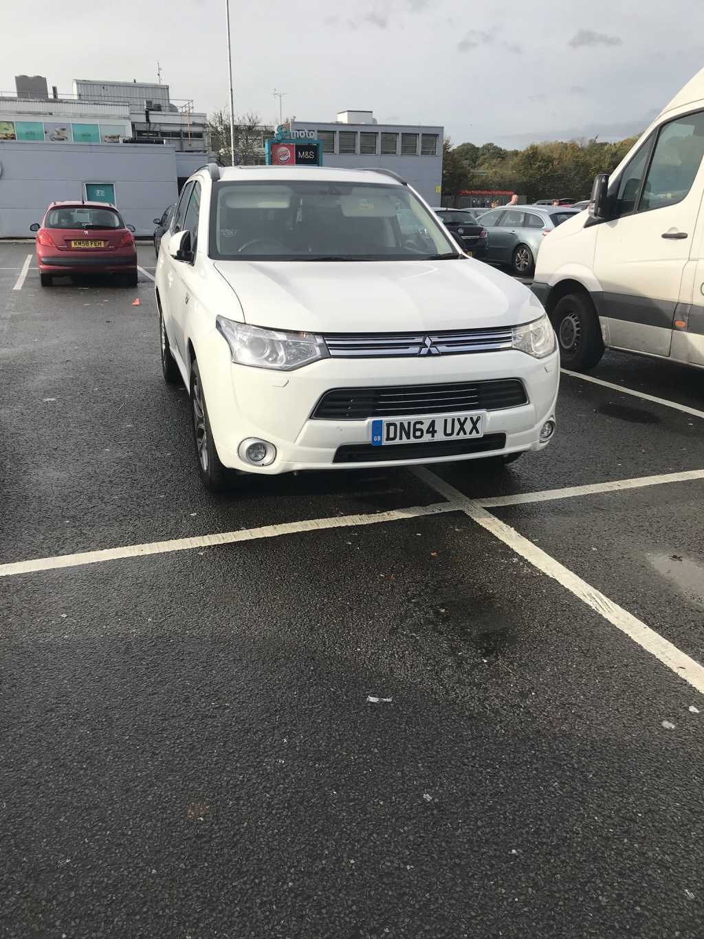 DN64 UXX displaying Inconsiderate Parking