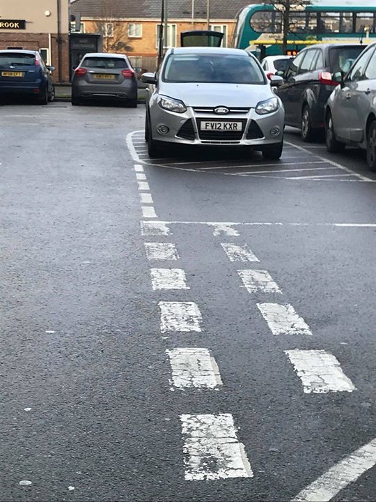 FV12 KXR displaying Selfish Parking