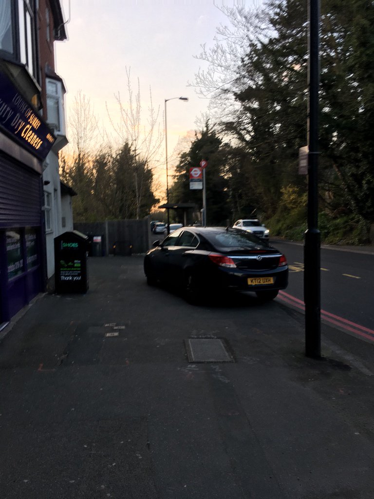 KT12 UXH displaying Inconsiderate Parking