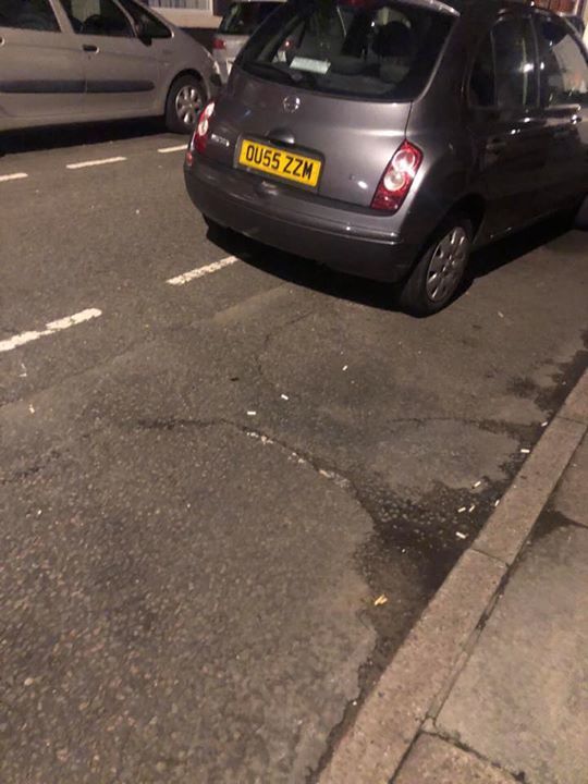 OU55 ZZM displaying Inconsiderate Parking